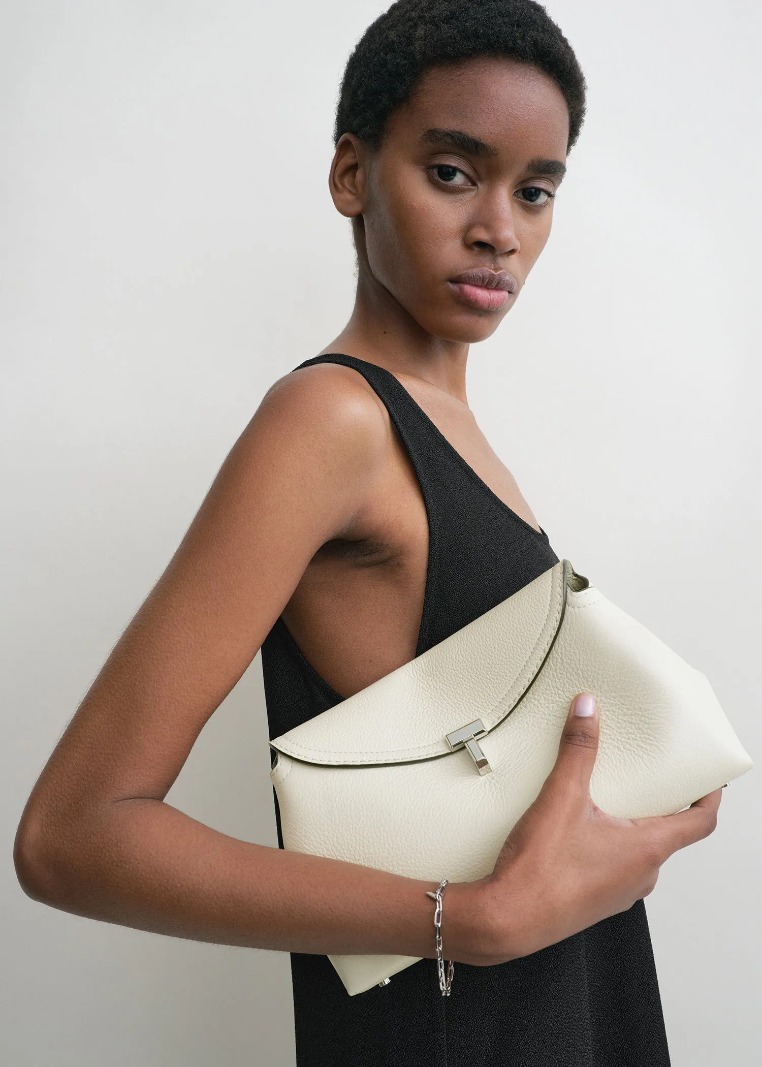 T-Lock grained-leather clutch milk